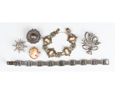 A silver gilt filigree and shell cameo link bracelet on a snap clasp, detailed '800', weight 16.4g, an oval shell cameo brooc