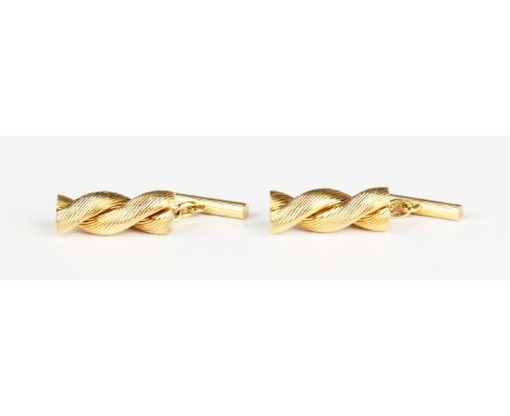 A pair of gold cufflinks, the fronts in a ridged ropetwist design, the backs in a ridged bar design, detailed '575', weight 1