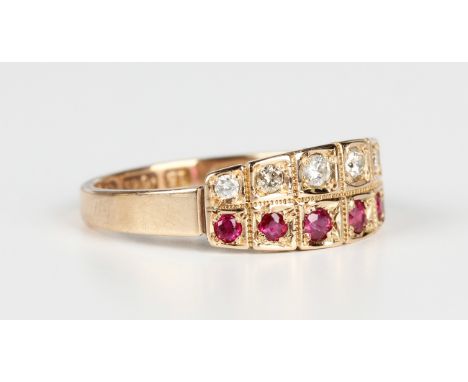 A Victorian 15ct gold, ruby and diamond ring, designed as two graduated rows of circular cut diamonds and circular cut rubies