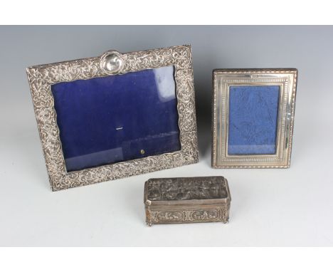 A late Victorian silver mounted rectangular photograph frame with pierced lattice and foliate scroll decoration, Birmingham 1