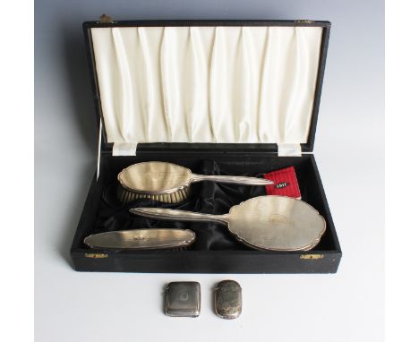 An Elizabeth II silver three-piece dressing table set with engine turned decoration, Birmingham 1960 by Adie Brothers Ltd, ca