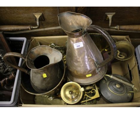 Two copper flagons, a copper kettle, brass bell and other brasswares