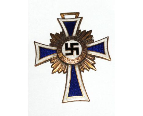 A German Nazi gilt and enamel Mothers Cross, dated on reverse 16th December 1938