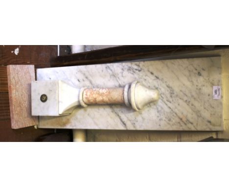 A pair of alabaster wall brackets, formerly from a fire surround, with pink marble shelf and pendant supports, 63cm high