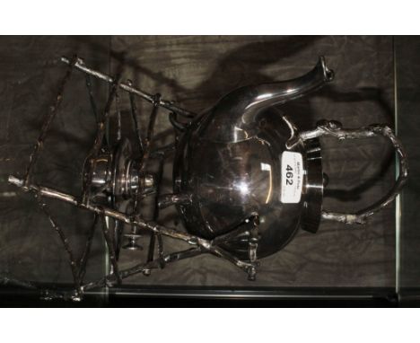 An E.P. spirit kettle on stand