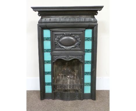 Art Nouveau style cast iron fireplace with green inset tiles, W89cm x H131cm
