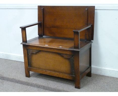 Early 20th century oak Monks bench with folding top, W92cm