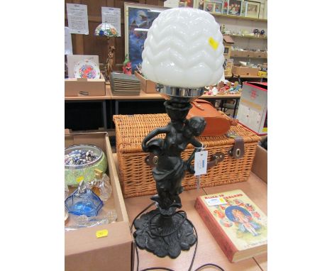 Cast metal figural table lamp with shade 