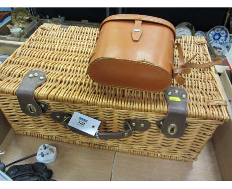 Picnic hamper and contents of plates, cutlery etc, and a pair of binoculars 