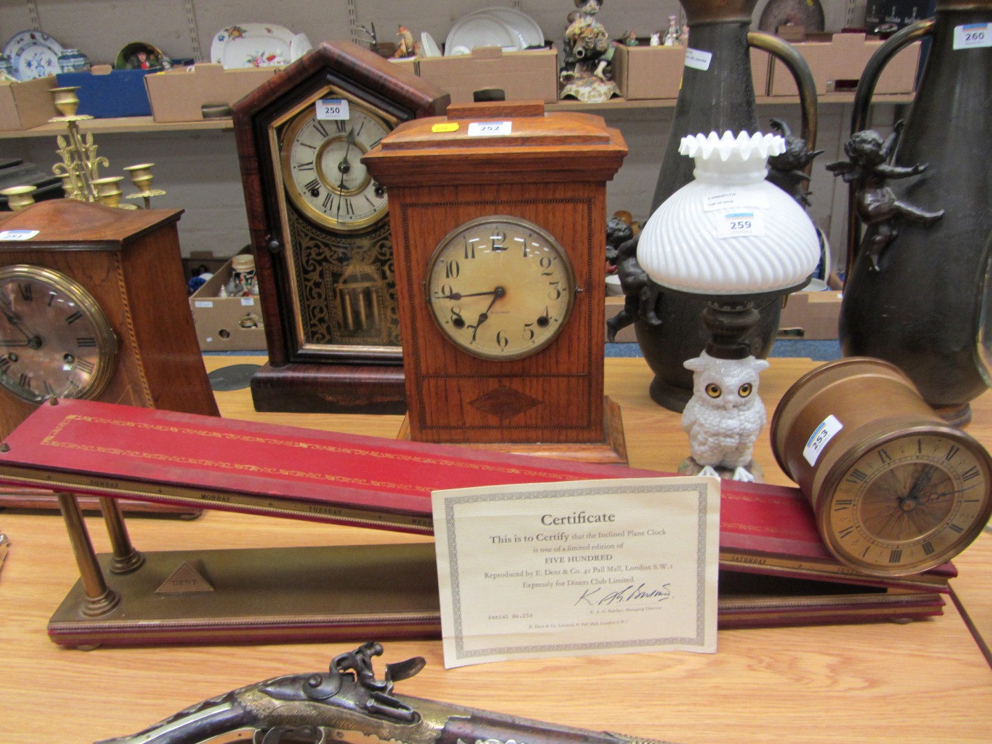 Dent of London 8 day Inclined plane clock, heavy brass base with tooled