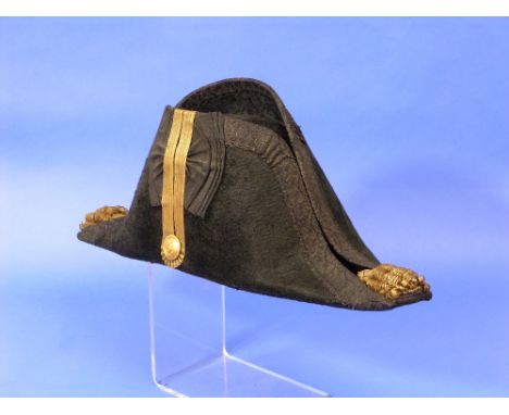A Navy officer's full dress black 'beaver' Cocked Hat, lined with pleated crimson silk and a leather sweatband, the upper edg