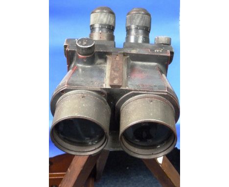 A pair of OdkiX D.F. 10 x 80 Binoculars, No.12311, on tripod stand.