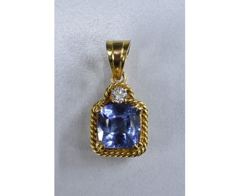 A sapphire and diamond pendant, principle Ceylon light blue sapphire measuring approx 9.43mm x 9.43mm, 6.50mm, estimated ston