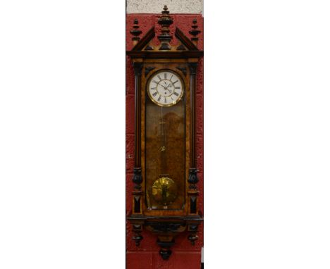 A 19th century burr walnut and ebonised Vienna regulator wall clock, 18cm circular enamel dial with Roman numerals, subsidiar