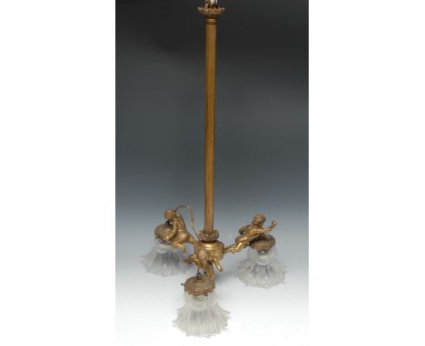 A 19th century gilt metal three-light ceiling lamp, long reeded pillar with lotus socle, above scantily clad putti supporting