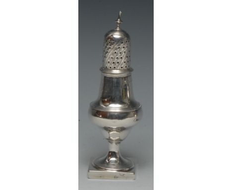 A George III silver pear shaped caster, knop finial, pierced cover engraved with diapers, reeded socle, square base, 14.5cm h