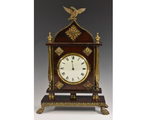 A Gothick gilt-brass mounted mahogany sedan mantel timepiece, 10cm white enamel with Roman numerals, thirty-hour movement wit