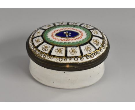 A George III South Staffordshire enamel oval patch box, the hinged domed cover decorated in the Neoclassical taste with an Ad