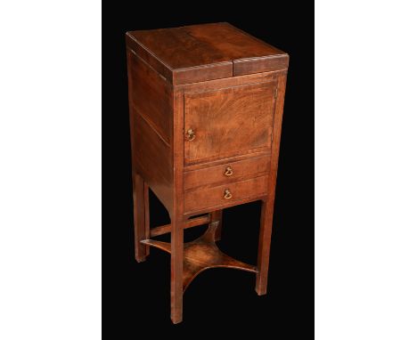 A George III mahogany gentleman's washstand, two piece folding top enclosing a plateau and a retractable mirror adjustable on