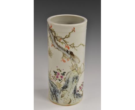 A Chinese famille rose cylinder vase, painted in polychrome and wash with an insect on a branch of blossom, the ground with g