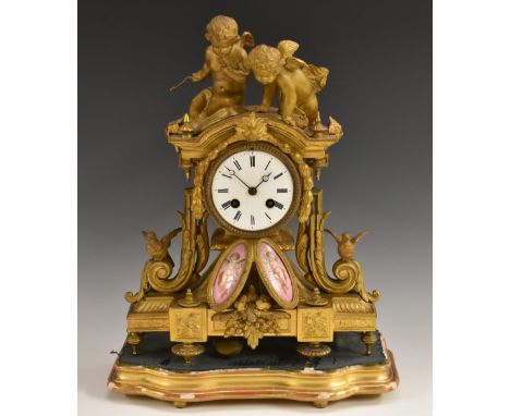 A Louis XV Revival gilt-metal and porcelain-mounted mantel clock, 9cm white enamel dial inscribed with Roman numerals, twin-w