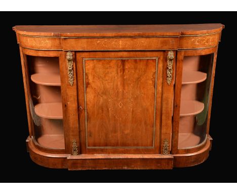 A Victorian gilt metal mounted walnut and marquetry credenza, oversailing top above a rectangular door flanked by curved glaz