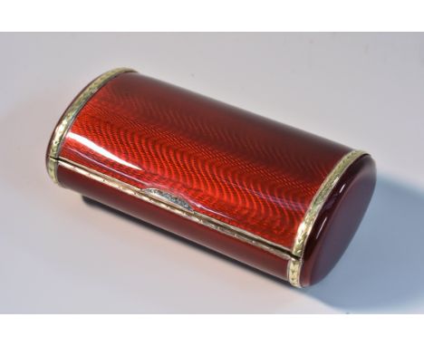 A Fabergé silver-gilt, guiloché enamel and diamond set oblong cigarette case, enamelled throughout in wavy alternating tones 