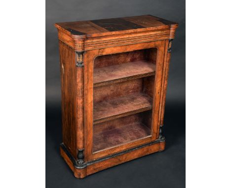 A Victorian gilt metal mounted walnut and marquetry pier cabinet, arched rectangular glazed door, flanked by a pair of column