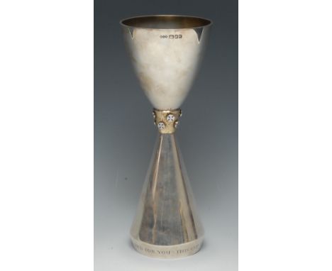 An Elizabeth II parcel-gilt silver and enamel Communion chalice, of double-conical form, the central band textured and applie