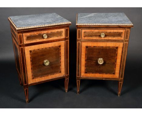 A pair of 19th century mahogany, rosewood and satinwood bedroom cabinets, each with grey marble top, egg-and-dart border abov