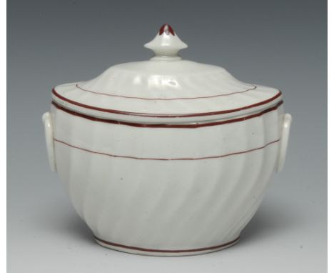 A Pinxton spirally fluted oval sucrier and cover, pattern 10, with drop oval handles, iron red line borders, stepped domed co