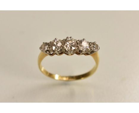 A diamond quintet line ring, set with five graduating round old brilliant cut diamonds, largest diamond approx 0.33ct, total 