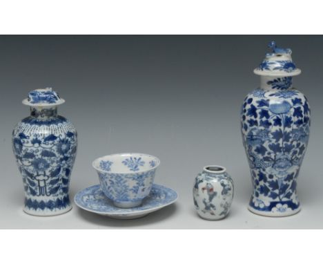 A Chinese miniature ovoid vase, decorated with jumping figures, 6cm high, sampan mark; a Chinese blue and white baluster case