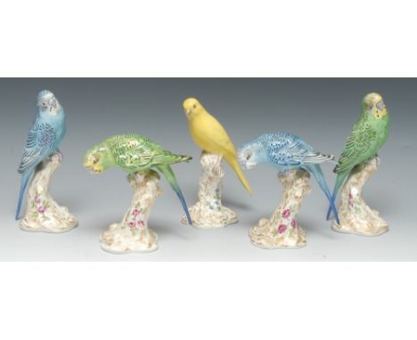 A Royal Worcester budgerigar, green, 18cm high, printed crown and circle mark in black, 2663; others, various; a similar cana
