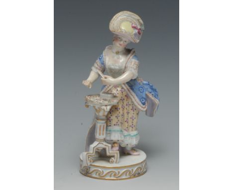 A 19th century Meissen figure, The Female Card Player, modelled after Michel Victor Acier, the aristocratic lady stands by a 