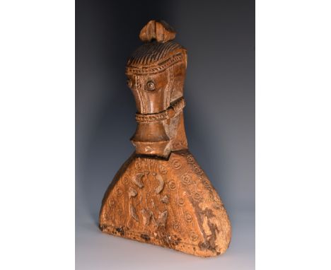 An 18th century Indian horse's head finial, probably Andhra Pradesh,  well carved with roundels, 27cm high, c.1780-1800 