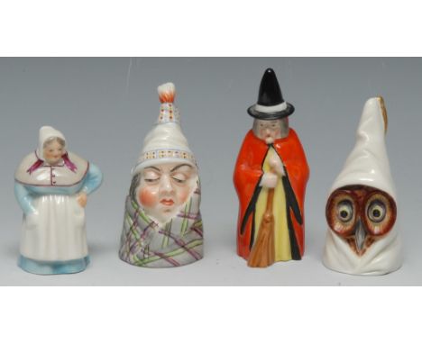 A Royal Worcester candle snuffer, Mr Caudle, wearing a night cap and blanket, lightly coloured, 8cm high, printed crown and c