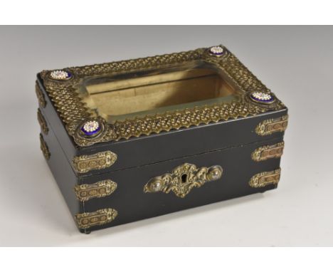 A 19th century French enamel and gilt metal mounted ebonised rectangular bijouterie casket, hinged cover with bevelled glazed