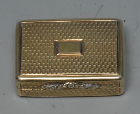 A William IV silver gilt vinaigrette, rectangular vacant cartouche, engine turned, pierced grille, 3cm wide, Nathaniel Mills,