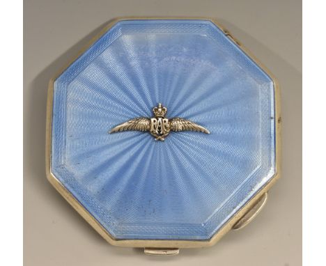 An Elizabeth II silver and enamel octagonal sweetheart powder compact, hinged cover engine turned and applied with RAF wings,