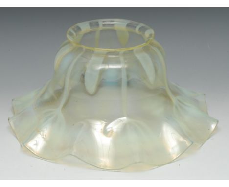 A late 19th century vaseline glass wavy edged light shade, approx 31cm diam, c.1870