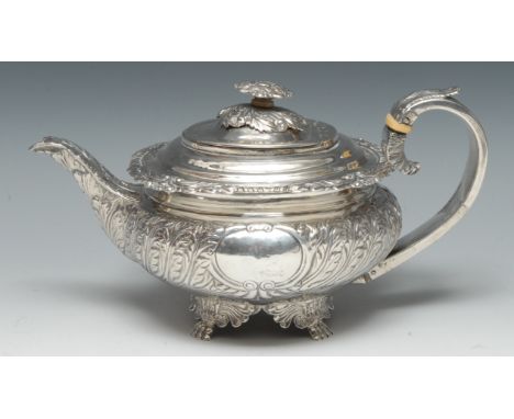 A George III silver bowed teapot, hinged cover, acanthus capped scroll handle, finial and border, 27cm long, London 1819, 24.