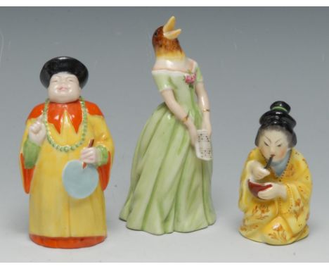 A Royal Worcester candle snuffer, Confidence, modelled as a singing Jenny Lind, the Swedish Nightingale, with a nightingale`s