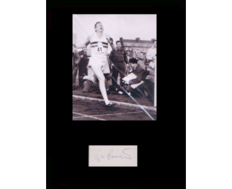 Four Minute Mile. Signature of Roger Bannister, completing the first sub-four minute mile race. Professionally mounted in bla