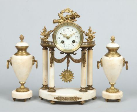 A 19th century French alabaster and gilt metal demi lune portico clock garniture. With enamel dial having Arabic numeral mark