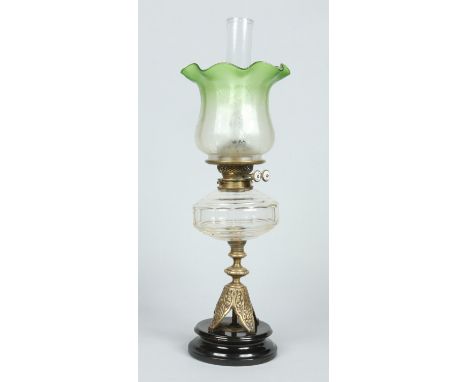 A Victorian brass based oil lamp with Duplex burner and marked for James Hinks & Son. Having green tint etched glass shade an