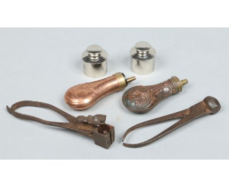 A .577 303 Enfield bullet mould, .46 bullet mould, two copper powder flasks and two chrome plated vessels.  Condition Report.