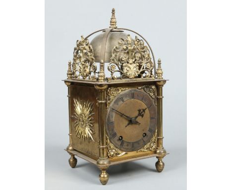 A 17th century style brass lantern clock by Winterhalder & Hofmeier. With putti spandrels and sunburst motifs to the sides, H