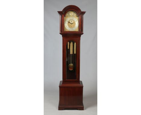 A large George V mahogany longcase clock with glazed trunk. With gilt arch top dial signed Edward Ewen, Dumfries. Having silv