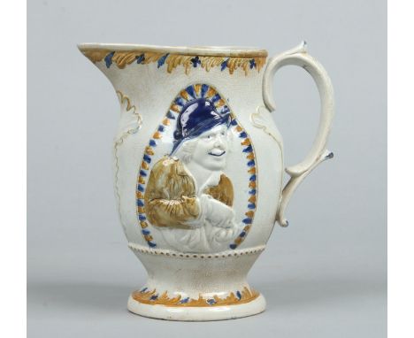 A large 19th century prattware jug. Moulded to each side with a portrait and coloured in enamels, 24.5cm. Condition Report. T